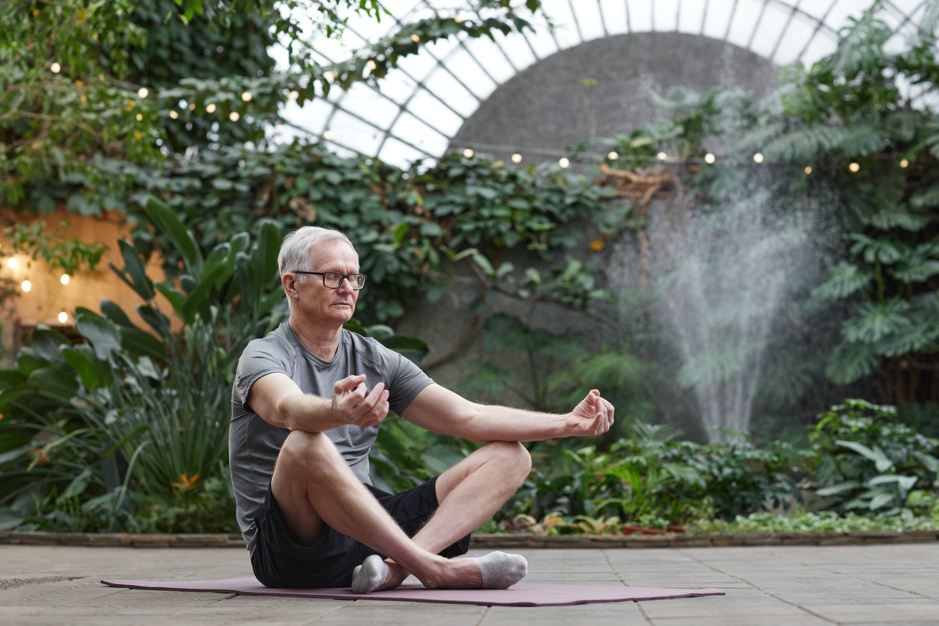 man practicing yoga