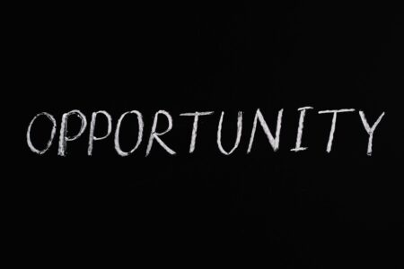 opportunity lettering text on black background