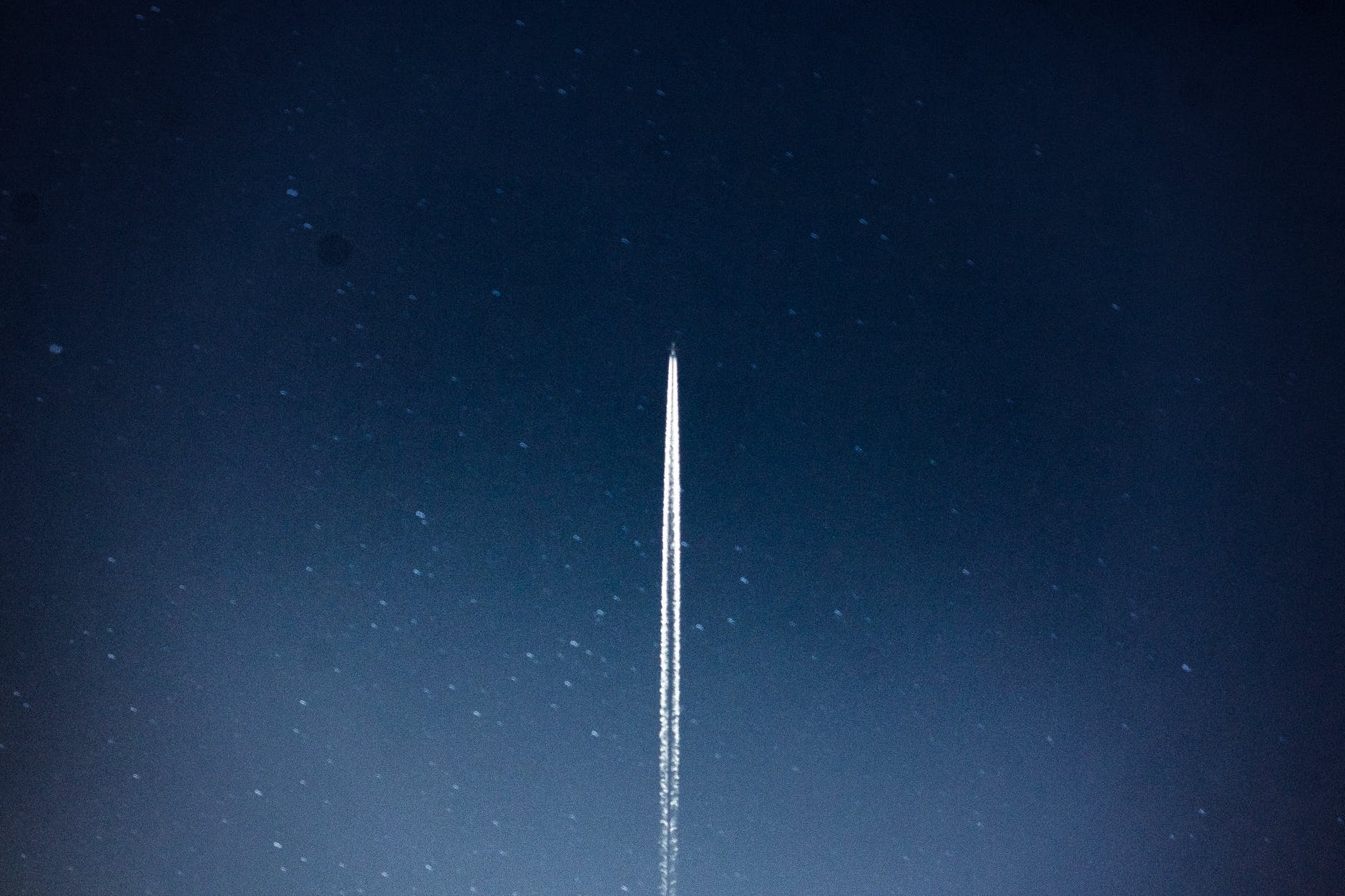 space shuttle launch during nighttime