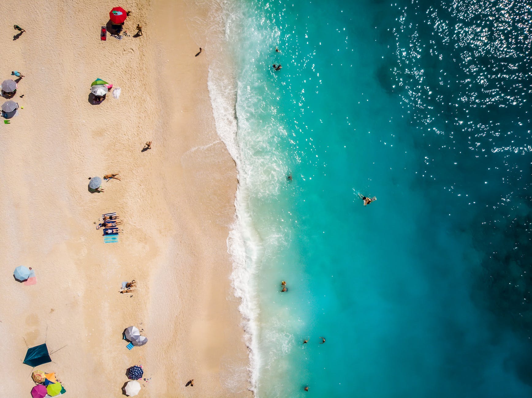 people having fun on the beach