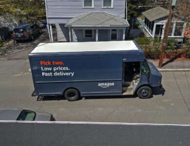 Charging Ecosystems for Cars,Trucks and Bus Fleets amazon prime delivery truck on street