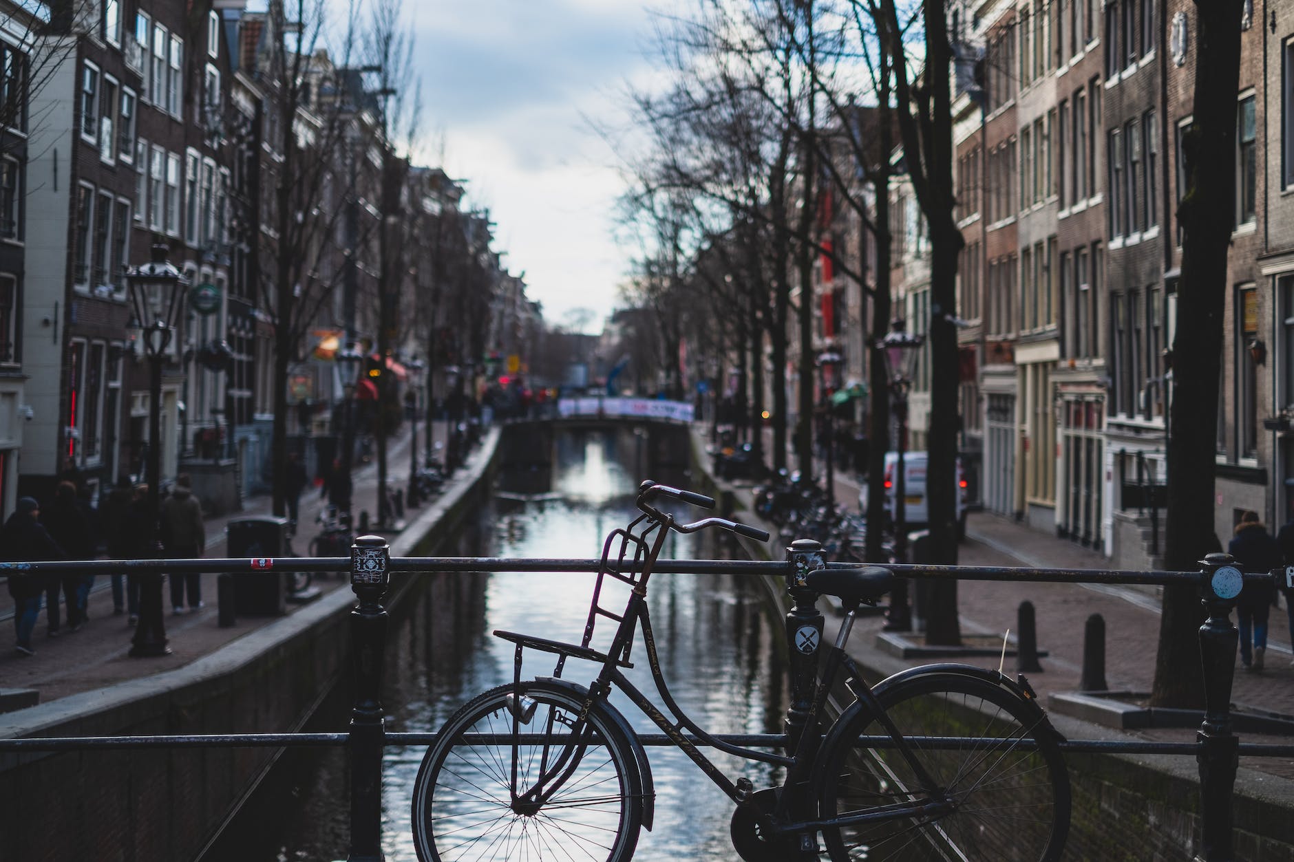 bicycle parked on a bridge