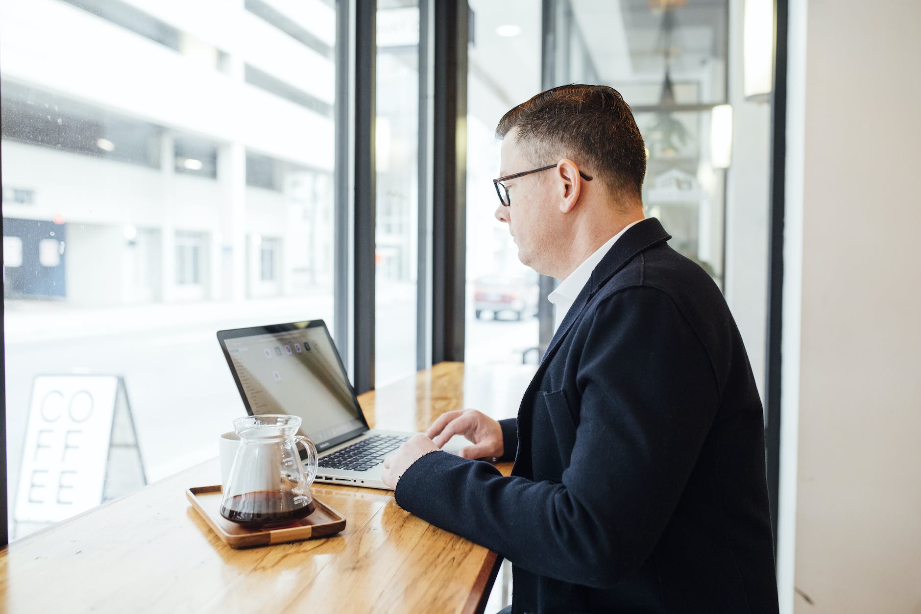 man using his laptop computer